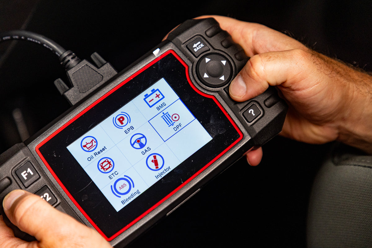 Diesel diagnostic scan tool in use